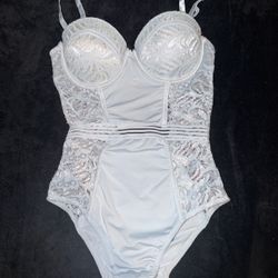  Light Blue lace lingerie bodysuit with underwire Push Up cups and adjustable straps.