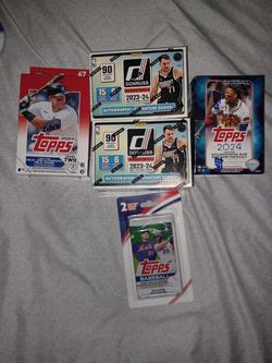 Variety Of Baseball And Football Cards