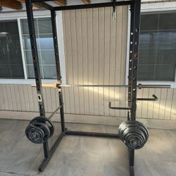 Standard Cage With Weights And Bowflex Bench