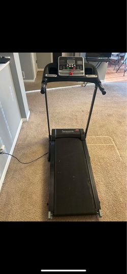 Small black treadmill