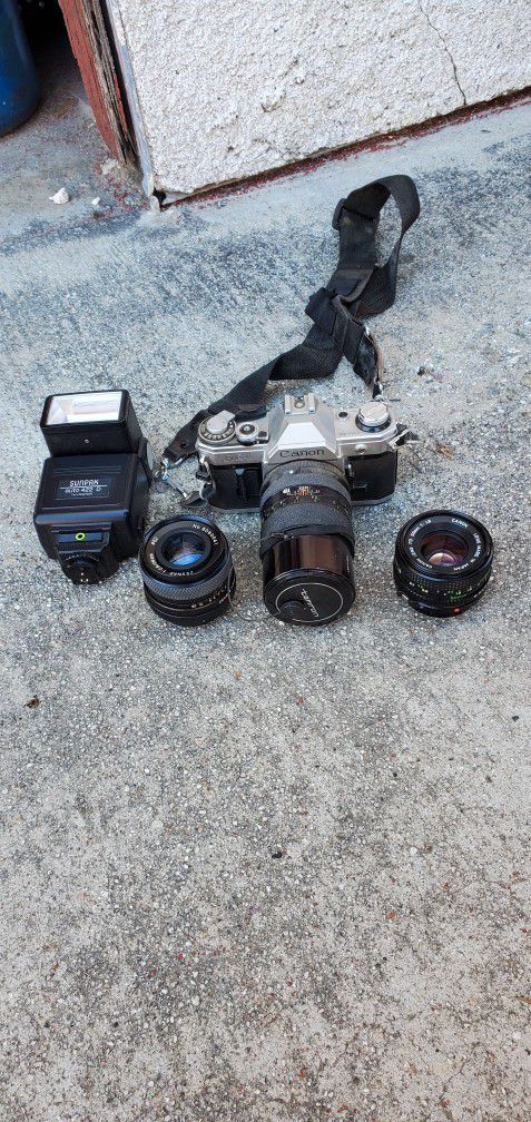 Canon AE-1 Body, 2 Lenses, Sunpak Flash and Case