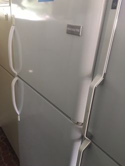 White top and bottom refrigerators/ one year warranty/ delivery and installation are available