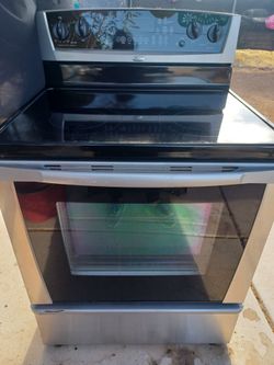 STOVE WHIRLPOOL  STEEL STAINLESS ELECTRIC EVERTING WORKS VERY CLEAN DELIVERY AND INSTALLATION AVAILABLE