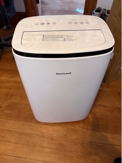 This is a Honeywell portable air conditioner (model HJ5CESWK7).