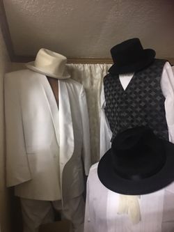 White Jacket & black and Silvers , Hat .