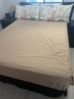 Queen bed with two nightstands and mattress