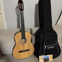     Guitar for Sale w/ Case + Extra Strings