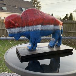 Red, white and blue buffalo statue