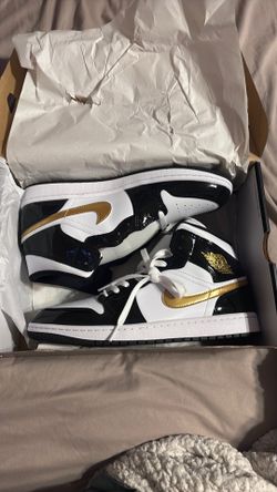 black white and gold Jordan 1s