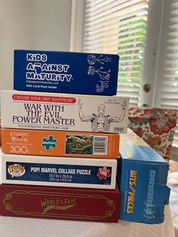 4  Boardgames Ages 10+ and 2 Puzzles