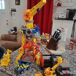 Rubble Construction crane, with extra pups and vehicles.
