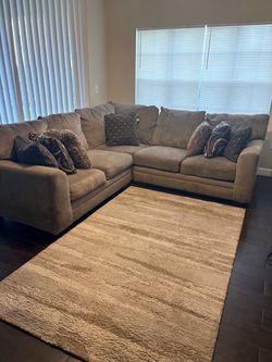 Beautiful couch! And rug!