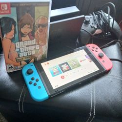 Nintendo Switch with GTA Games, Baseball Game, And Wired Controller