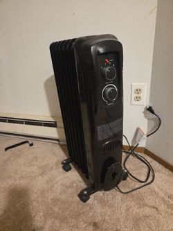 Oil-filled radiant electric space heater