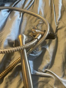 Shower wand assembly with hose