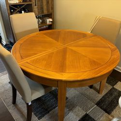 Wooden kitchen table, convertible circle to oval