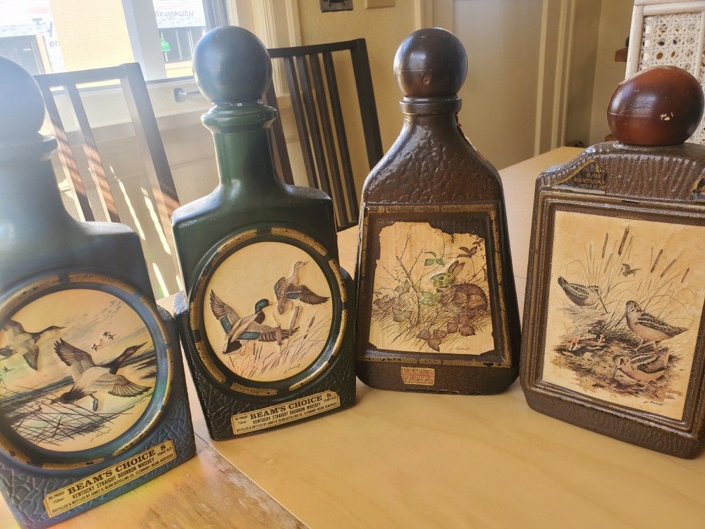 Set Of 4 Antique Beam Whiskey Bottles With Woodland Art