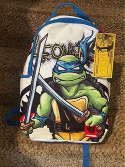 Spray ground backpack