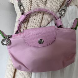 Mini pink Longchamp handbag