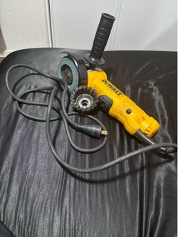 DEWALT angle grinder with disc and wire wheel