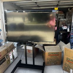 42” Panasonic TV On Rolling TV Stand 