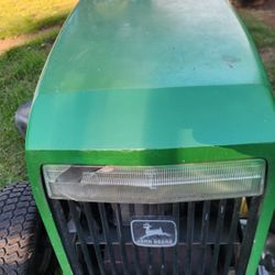 John deere  riding mower . runs and cuts great