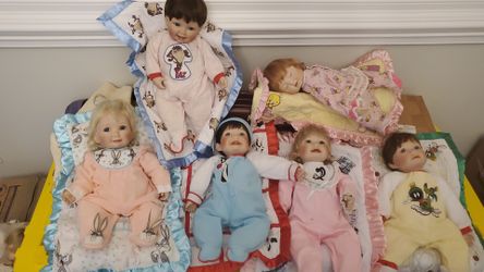 6 Super cute, lifelike porcelain dolls. Looney tunes.