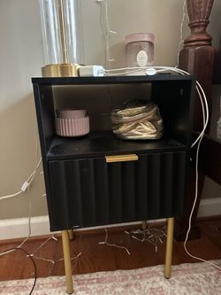 Black and gold night stand