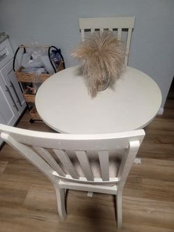 Table and two chairs