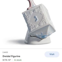Lladro Dreidel Figurine With Stand 