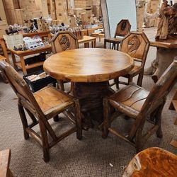 Set of 4 hand carved solid tank bar stools 24 inch seat height.