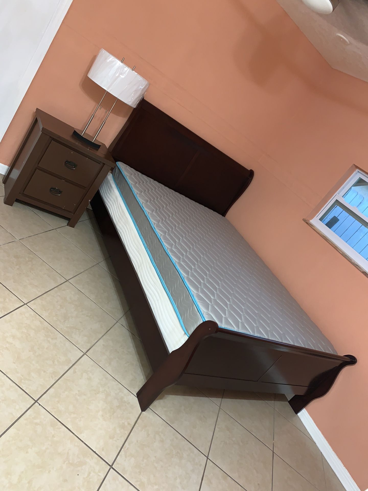 Queen bed, wood frame, box spring and mattress included