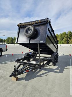 NEW DUMP TRAILER 12x8x4 12000 LBS
ROLLING TARP--SPARE TIRE,ELECTRIC BRAKES,HYDRAULIC SYSTEM,REMOTE CONTROL,IDEAL FOR HAULING, DEMOLITION, TRASH ETC,