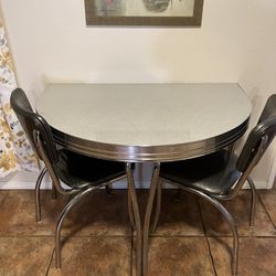 Dinner style  1/2 Table + 2 Chairs =$175