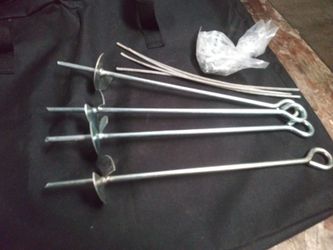 Spikes for holding down car port on grass
