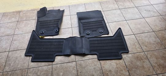 Laterales de Toyota Tacoma y alfombras en leder