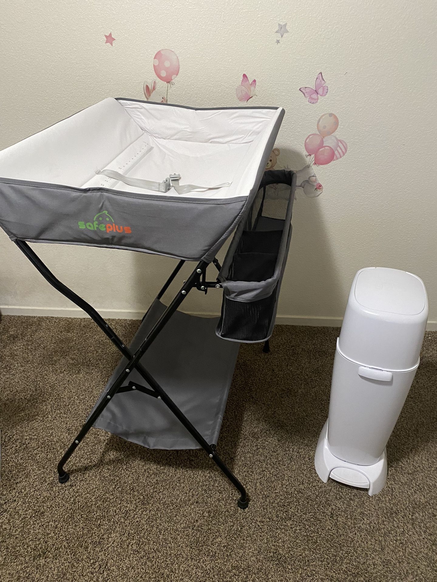 changing table and diaper genie