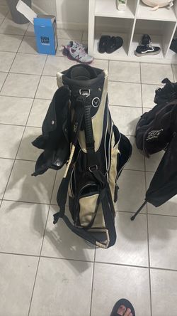 Golf bags with clubs