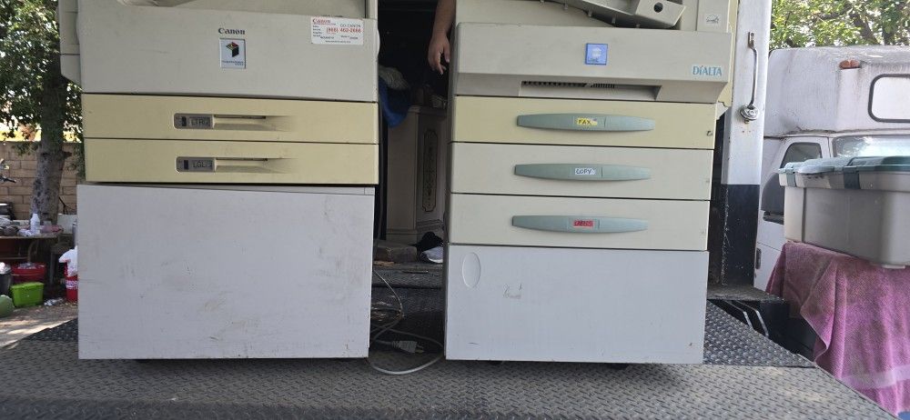 Two Large Comercial Printers, One Is CANON AND THE OTHER MINOLTA. "FOR PARTS"