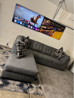 * Like New * Living Spaces 2pc Modular gray sectional sofa & built in bed ( Free Delivery )