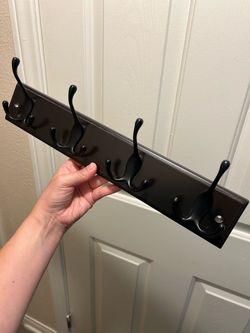Wall mounted hanging rack