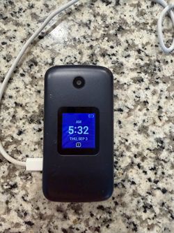 Alcatel 4058W Flip Phone – Working – Metro SIM Locked