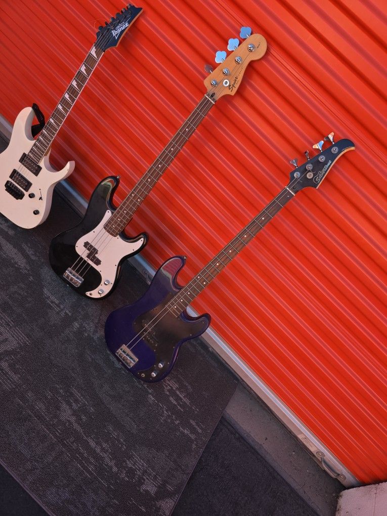 2 Bass Guitars