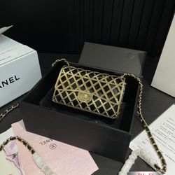 Business black and gold outlined crossbody handbag
