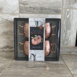 Set of 4 brand new copper Moscow mule cups from silver one