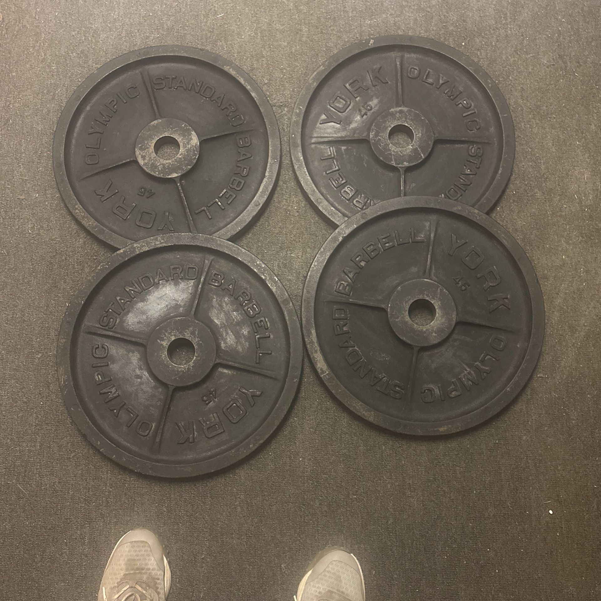 4 45 Lb York Barbell Plates