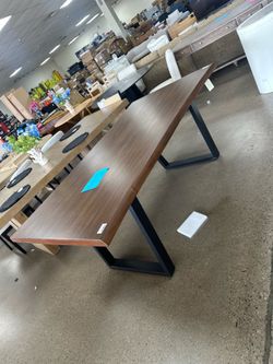 Walnut rectangular table fits 6 chairs (chairs not included)