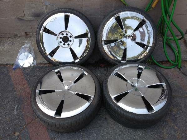 Four 4 lug chrome wheels and old tires. 4 on 100mm or 4 on 4.5