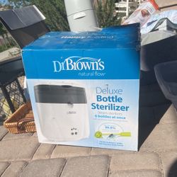 Lots Baby Items. Diaper Genie, Bouncer, Bottle Sterilizer Baby Gates