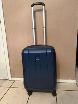 DELSEY BLUE SMALL LUGGAGE WITH WHEELS (H 20” x W 15” x Deep 10”)GOOD CONDITION